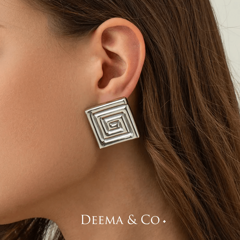 G large earrings silver