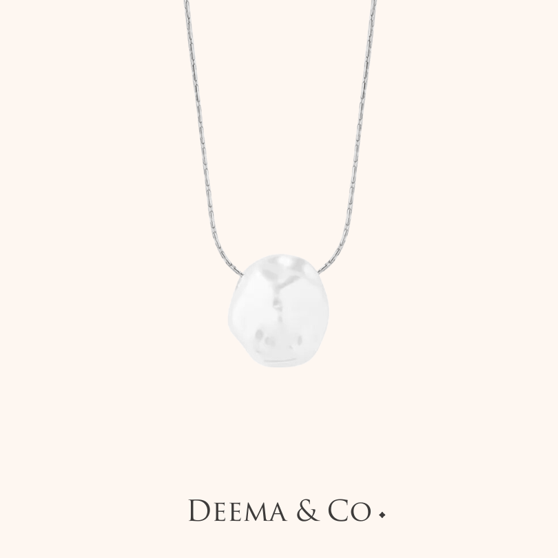 silver mette coin pearl